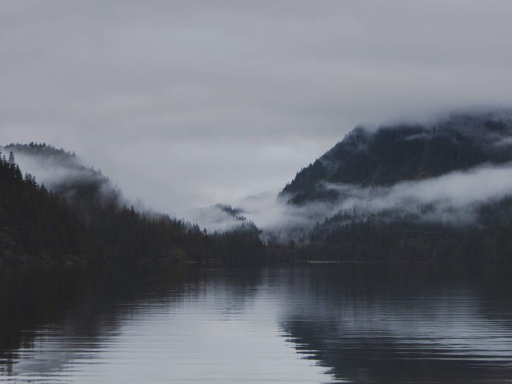 Mist over a mountain lake in British Columbia