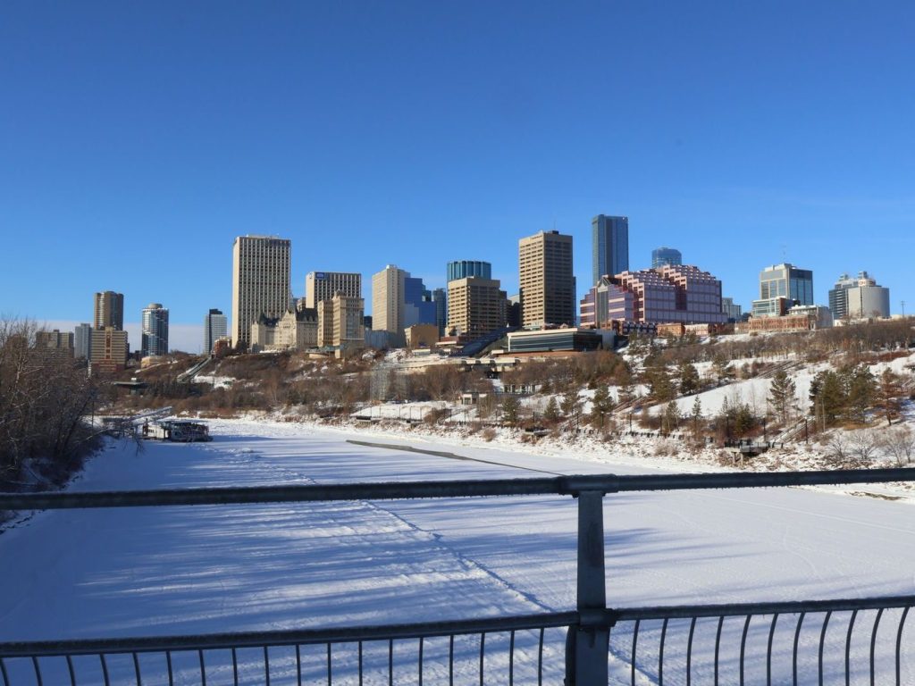 Edmonton skyline above the snow-covered river valley in winter