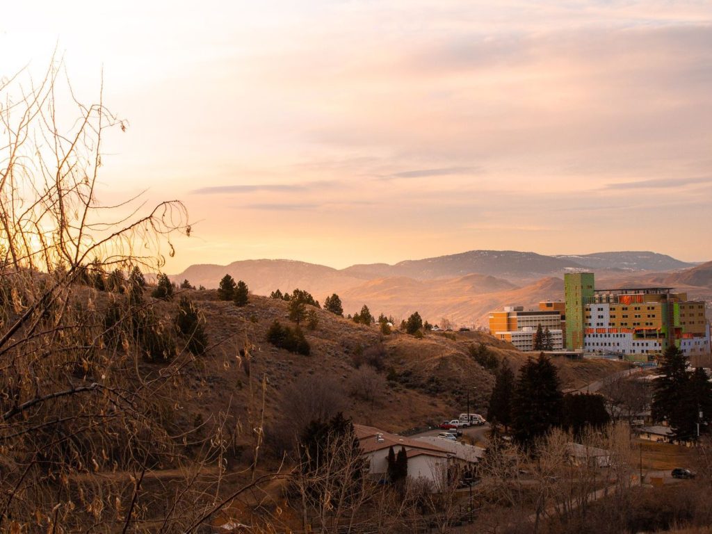 Sunset over the hills and buildings of Kamloops, BC