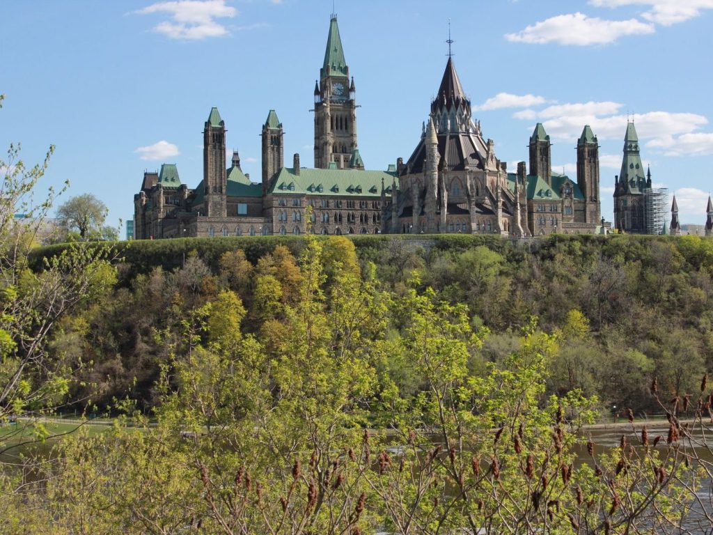 Parliament Hill in Ottawa in spring, seen from across the river